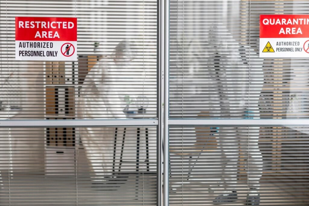 people-protective-equipment-disinfecting-dangerous-area_23-2148848597